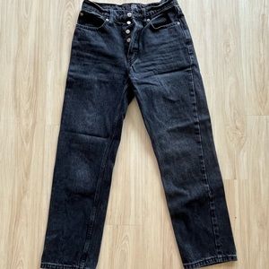BDG black, relaxed straight-leg jeans. Mid rise. Size 25